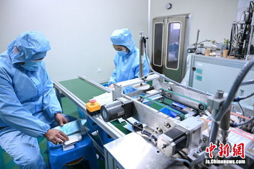 揚州一企業加緊口罩生產保供應